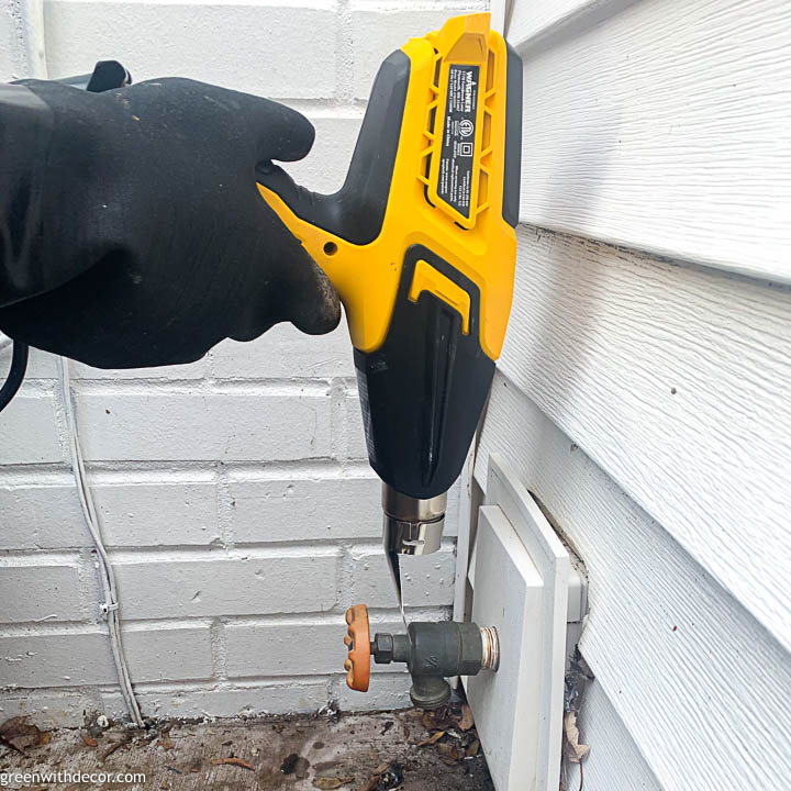 Heat the spigot with heat gun